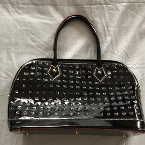 Arcadia patent leather purse